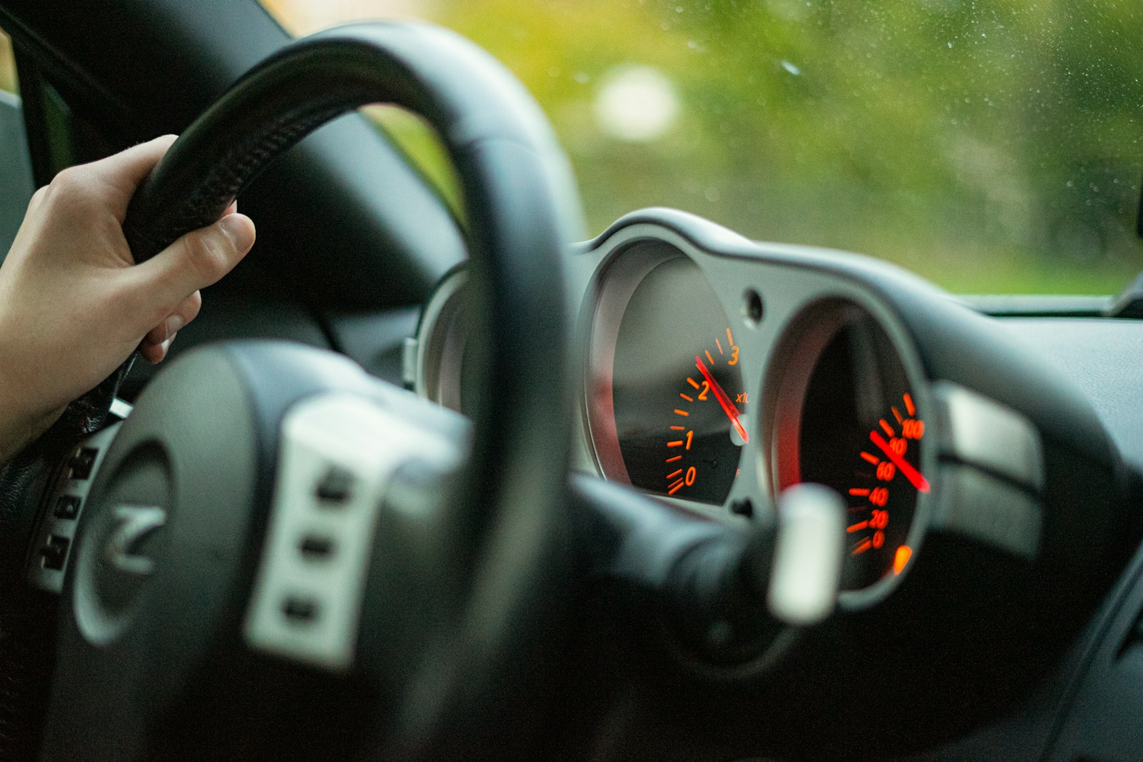 black and silver steering wheel