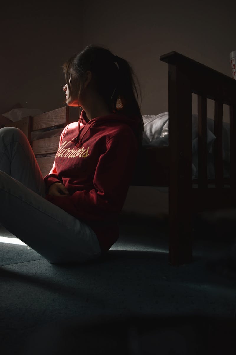 Photo Of Woman Sitting On Floor